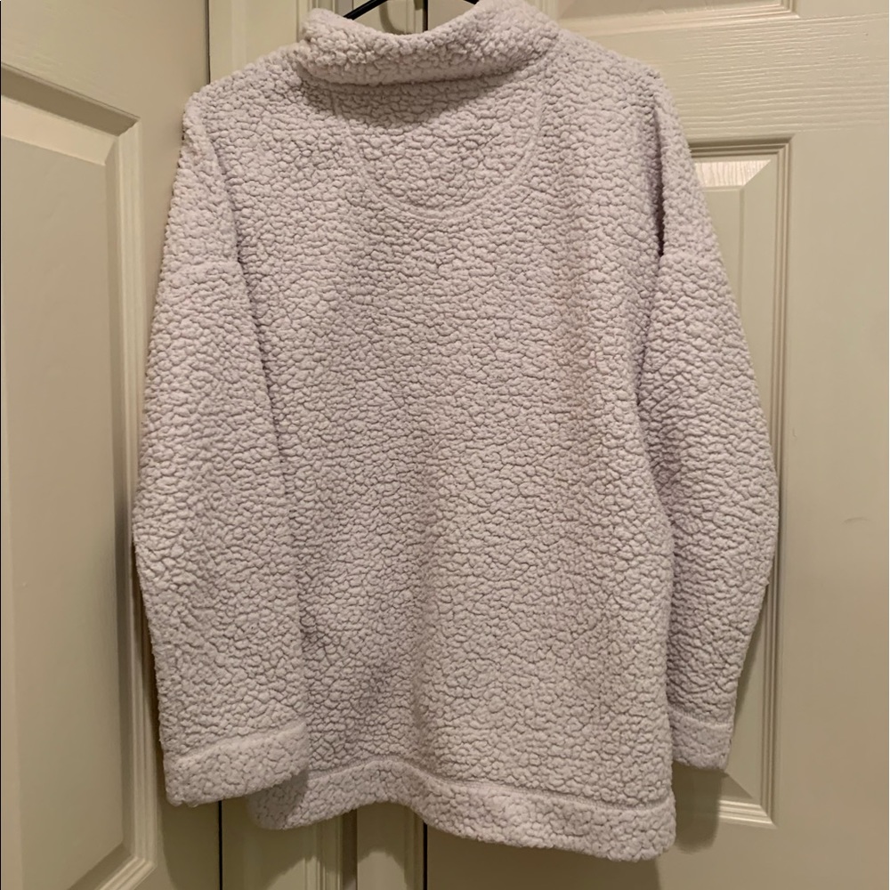 Size small, white fleece button up jacket.